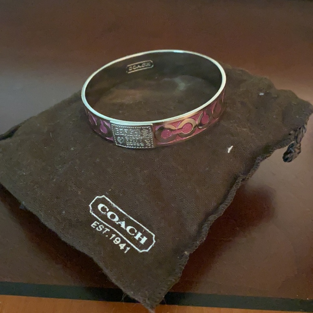 Sterling silver Coach bangle. Purple and silver